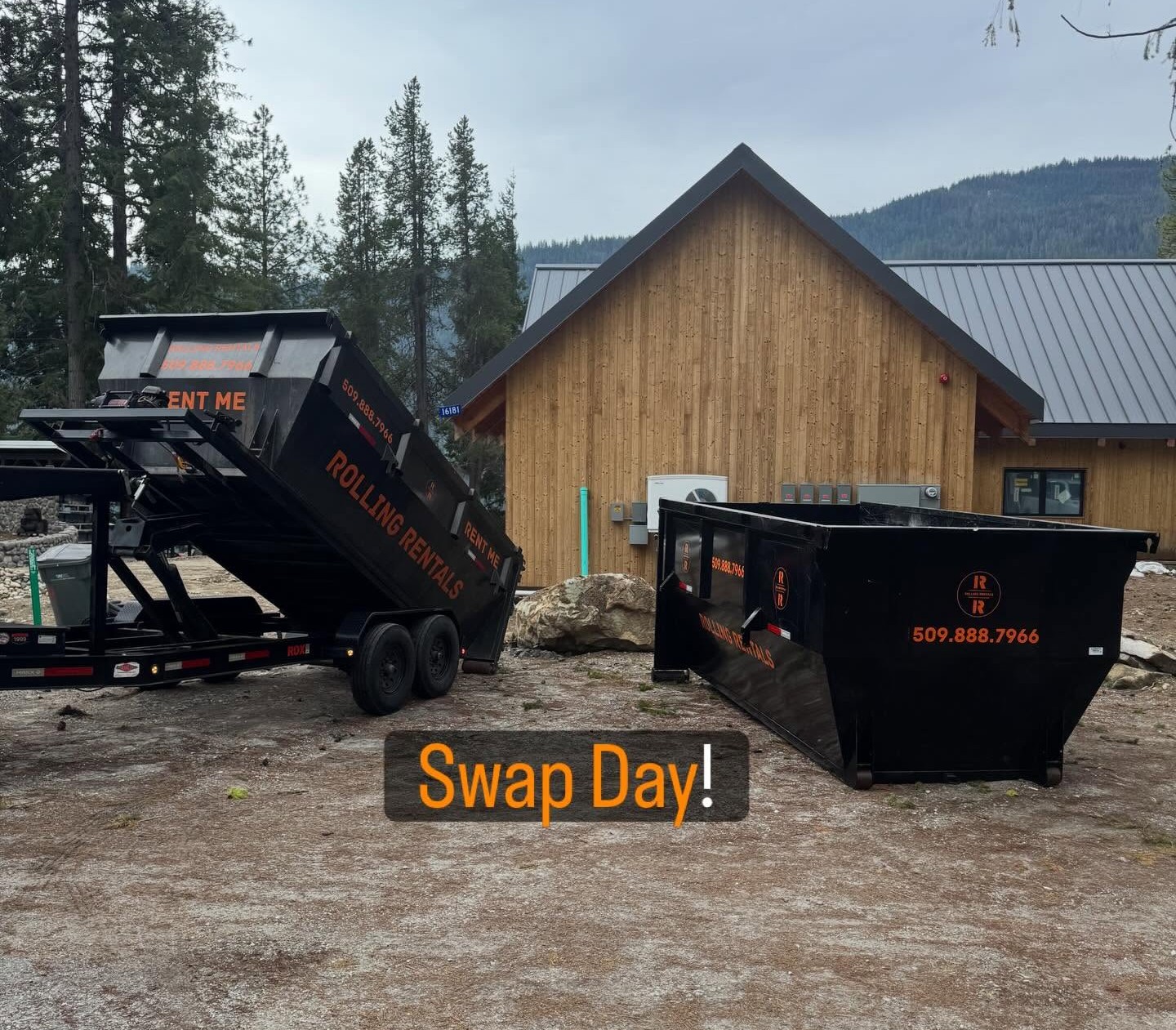 Two Rolling Rentals dumpsters staged side by side in the Wenatchee Valley