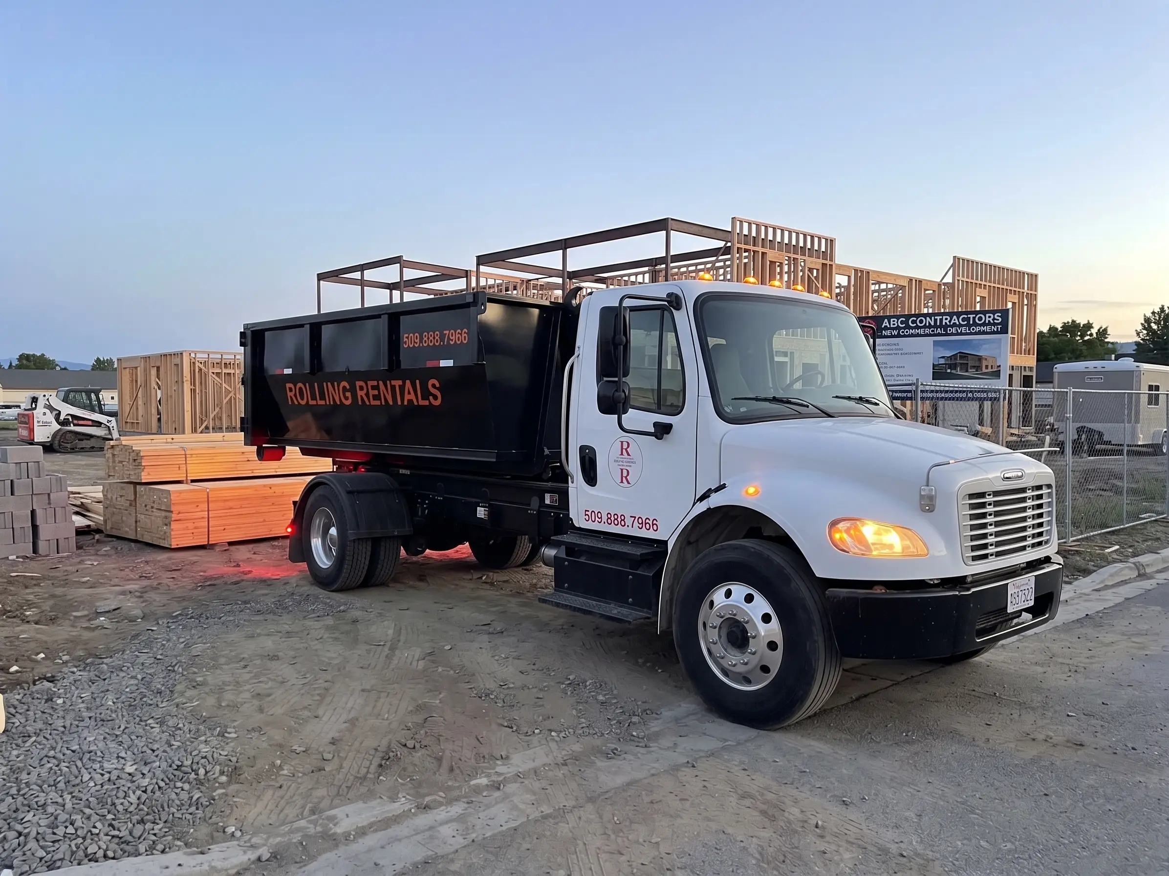 Rolling Rentals construction dumpster on an active jobsite in the Wenatchee Valley